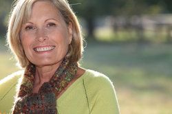 A woman outdoors smiling